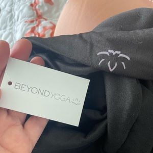 Infinity scarf with zippered pocket